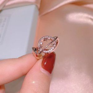 CZ Saturn and stars ring rose gold